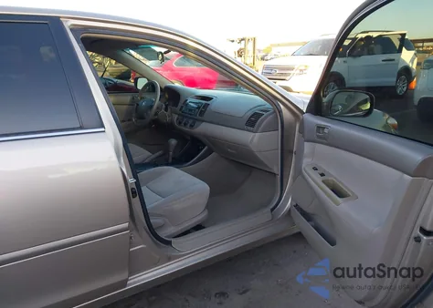 2002 Toyota Camry Le from USA, damaged, VIN 4T1BE32K42U515696